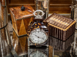 Tortoiseshell Lantern clock in a decorative collectors setting