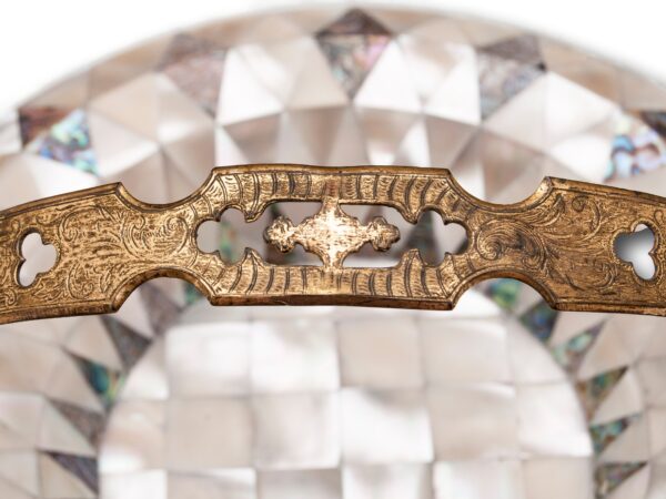 Close up of the handle on the Antique Mother of Pearl Basket