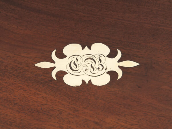 Close up of the initial plaque on the lid of the solid mahogany jewellery box