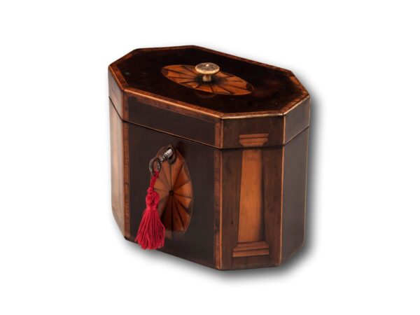 Overview of the Georgian Harewood Tea Caddy with the key inserted