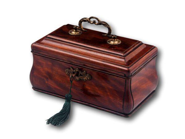 Overview of the Dutch Mahogany Tea Chest with the key inserted