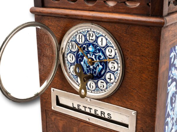Close up of the clock with the glass door open and key inserted