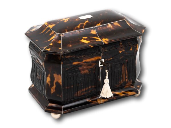 Front overview of the Pressed Regency Architectural Tortoiseshell Tea Caddy with the key inserted