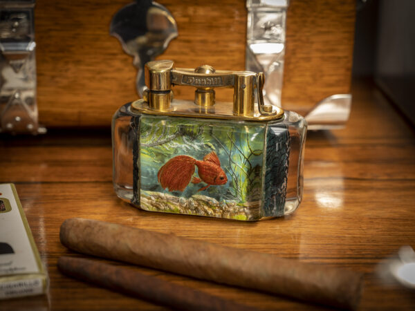 Alfred Dunhill Aquarium Lighter on side board with cigars
