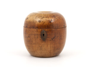 Apple tea caddy on a white background