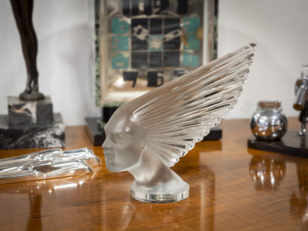 Rene Lalique Victoire on display with art deco items