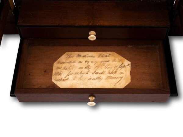 Close up of the handwritten label in the drawer