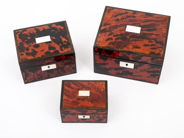 3 red tortoiseshell boxes