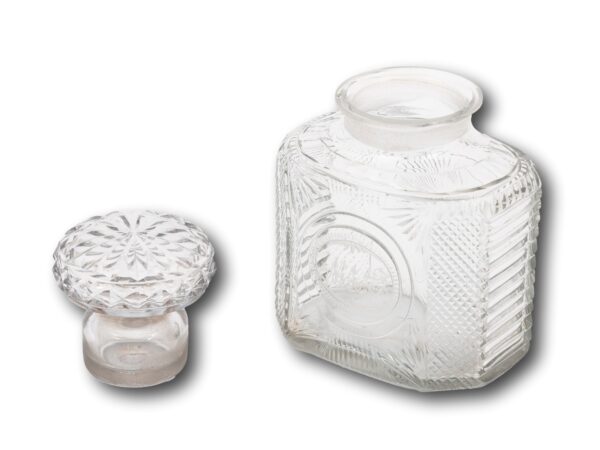 Overview of the cut glass tea caddy with the stopper removed