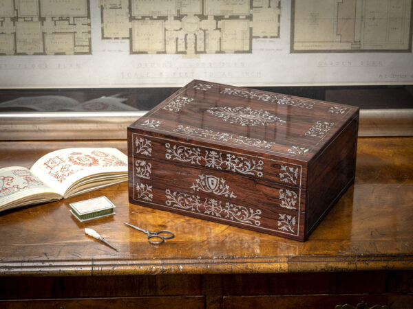 Overview of the Georgian Rosewood Sewing Box by Leuchars in a collectors lifestyle setting