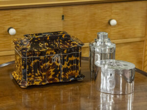 Tea caddy in a decorative collectors setting