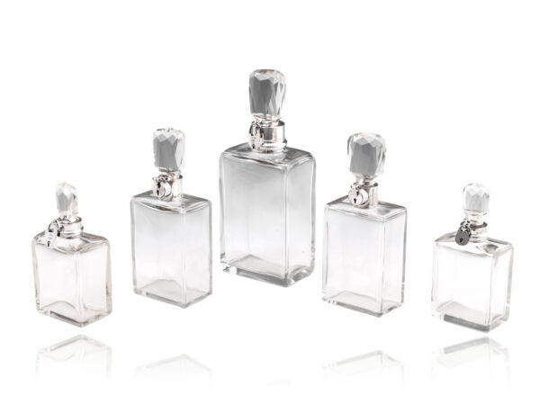 Overview of five decanter bottle set by hukin and heath
