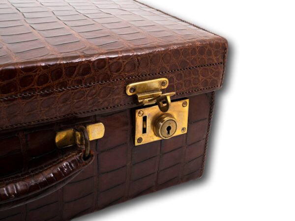 Close up of the latch and lock on the Art Deco Crocodile Luggage Case