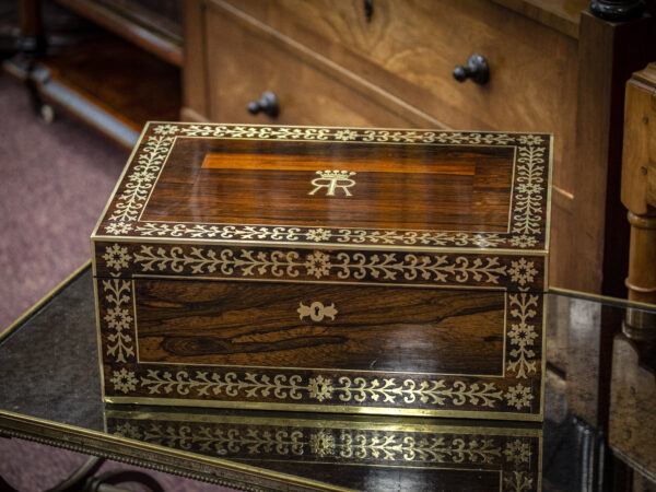 Rosewood box in a decorative collectors setting