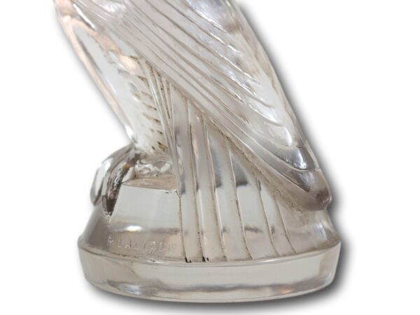 Close up of the feet of the Falcon Rene Lalique car mascot