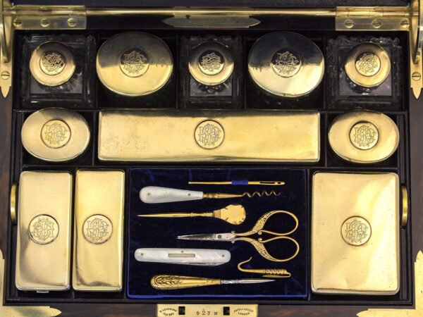 Close up of all the silver gilt lids and sewing components