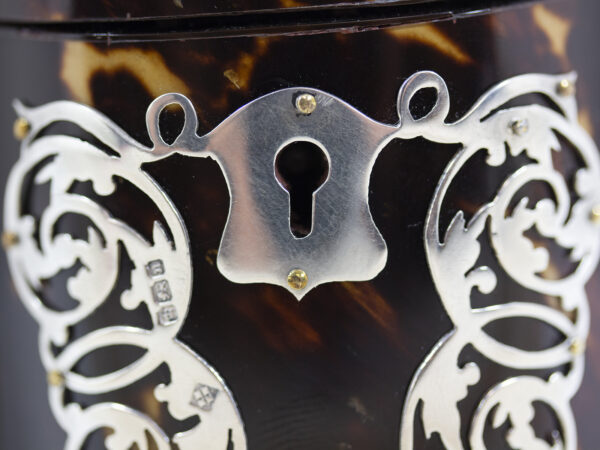 Close up of the escutcheon of the Novelty Knife Box Tea Caddy