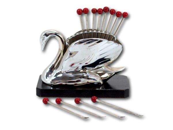 Side of the Art Deco Swan Cocktail Stick Holder with some cocktail sticks removed