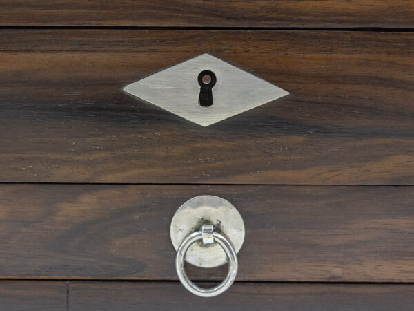 Close up of the escutcheon and drawer handle