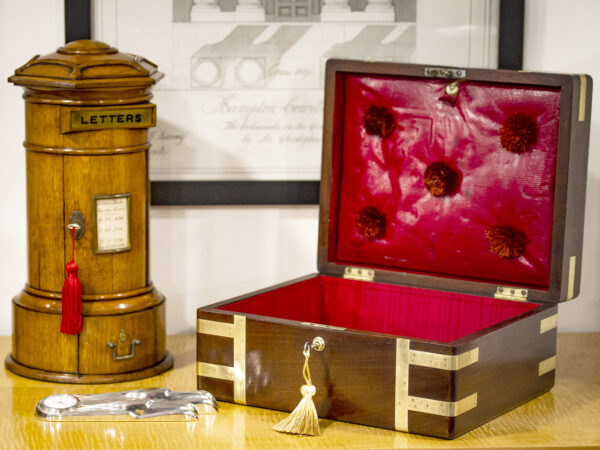 Georgian Mahogany Jewellery Box in a decorative collectors setting to show its scale