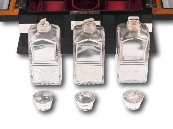 Close up of the Perfume bottles with the silver lids removed