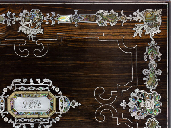 Close up of the intricate mother of pearl and abalone decoration