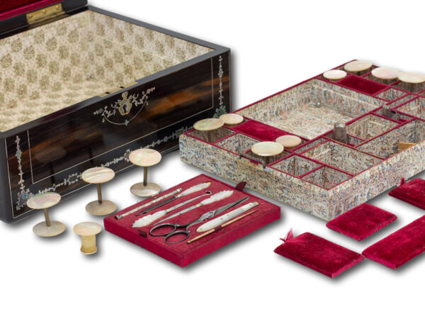 Close up of the Coromandel and Mother of Pearl Mechi Sewing Box with the lid open, top tray removed and top tool pad removed and various tools