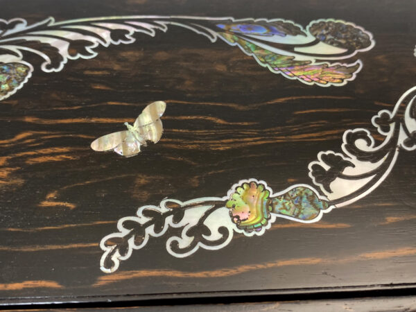 Close up of the mother of pearl inlay