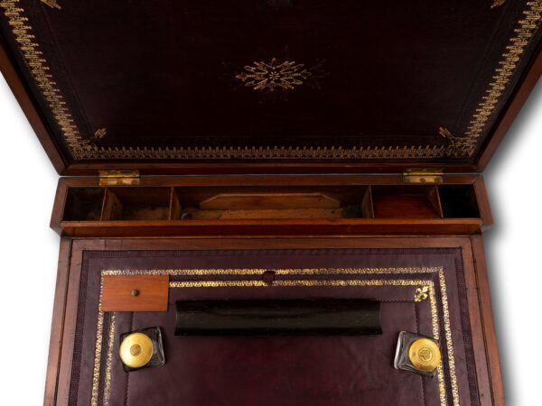 Close up of the inkwells, pen tray and lidded compartment removed