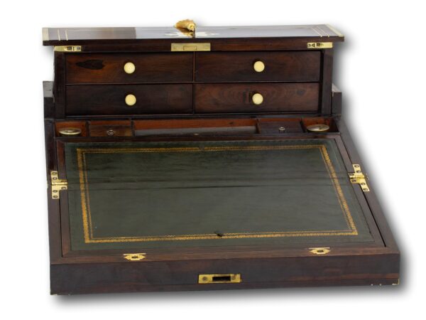Rosewood writing box opened showing the green leather writing slope and the rear drawers up