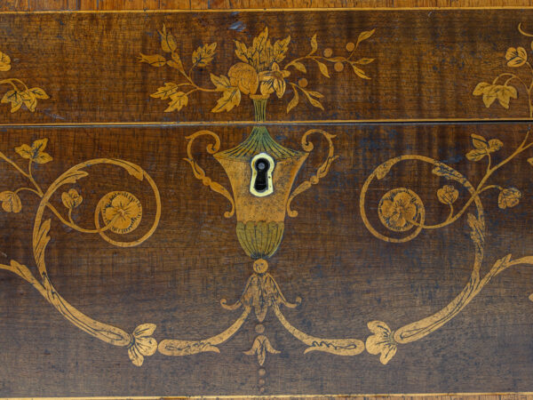 Close up of the escutcheon and inlaid decoration
