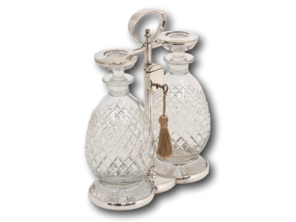 Overview of the Hukin & Heath Decanter Tantalus Set with the key inserted