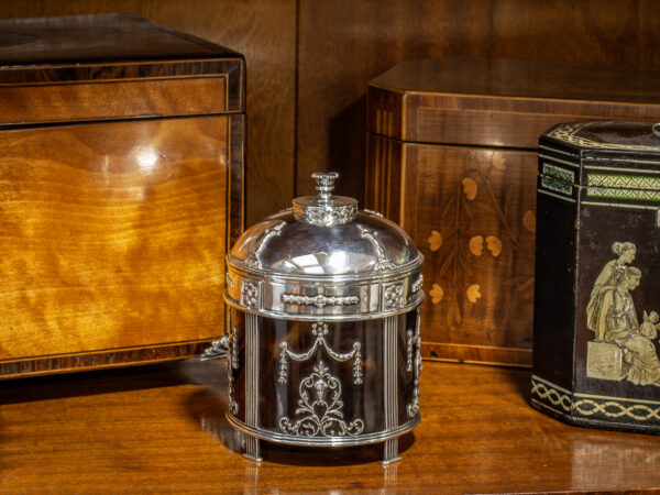 George Fox Edwardian Silver & Tortoiseshell tea caddy in a decorative collectors setting to view the scale