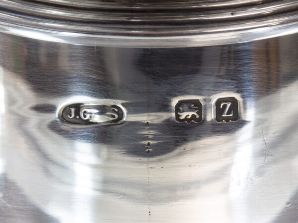 Close up of the John Grinsell & Sons birmingham silver hallmark