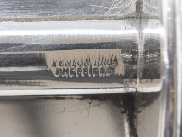 Close up of the Fenton Bros Sheffield mark on the silver plate
