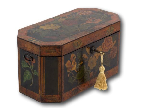Overview of the painted tea caddy with the key inserted