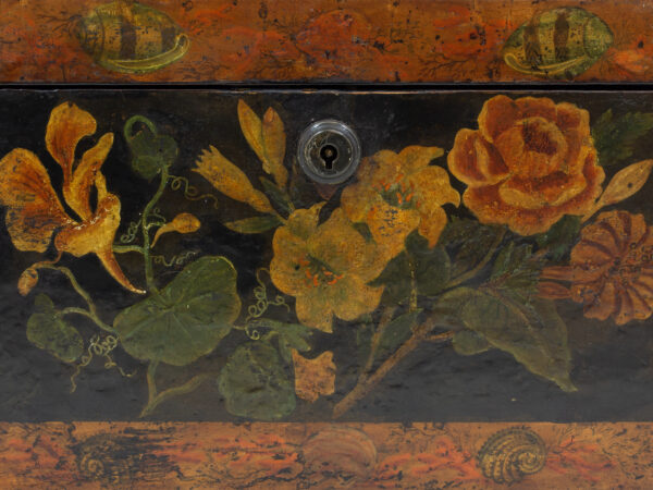 Close up of the front of the painted tea caddy