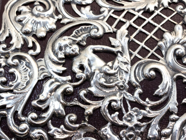 Close up of the silver work on the front of the Stationery Box