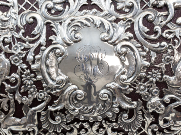 Close up of the silver initial plaque