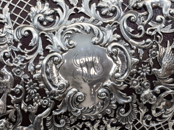 Close up of the silver initial plaque