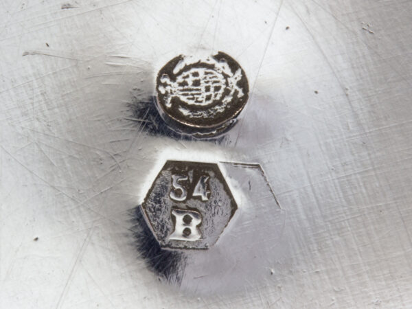 Close up of the silver hallmarks