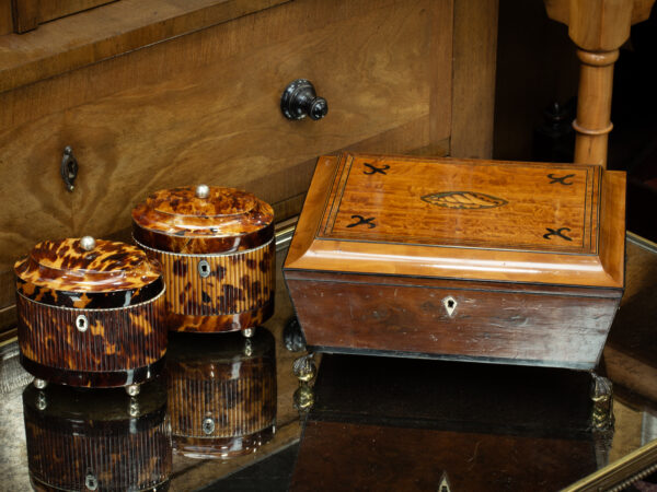 Overview of the Satinwood Jewellery Box in a decorative collectors setting