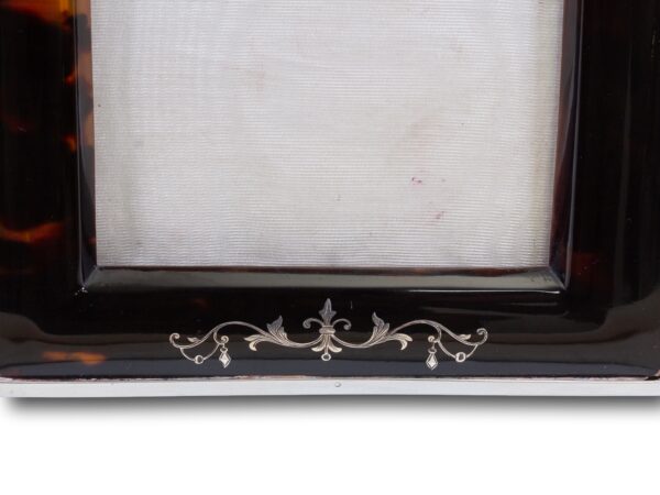 Close up of the bottom half of the tortoiseshell photo frame