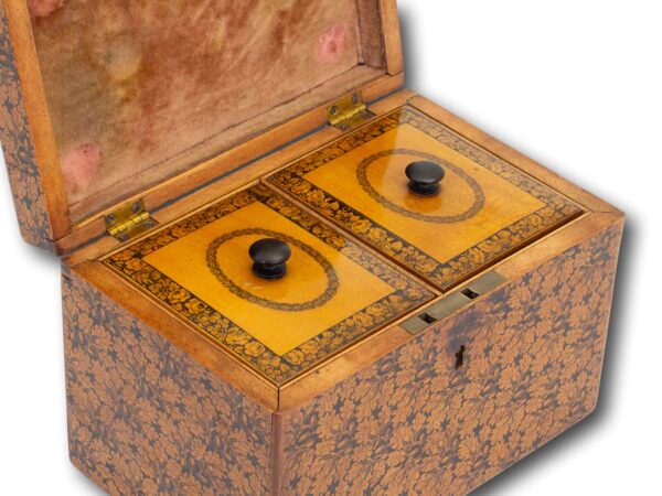 Close up of the decorated tea caddy lids