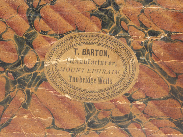 Close up of the T. Barton makers label