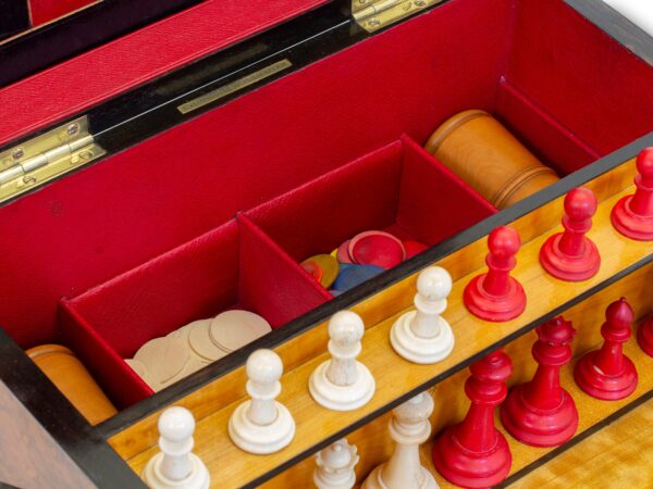 Close up showing the two top trays removed revealing the counters and dice shakers