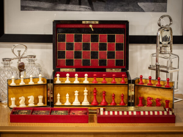 Overview of the Feathered Burr Walnut Games Compendium in a decorative setting