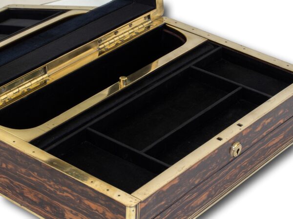 close up of the jewellery compartments with the spring loaded tray sat in the home position