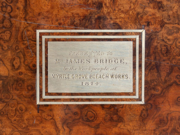 Close up of the Initial presentation plaque to the lid