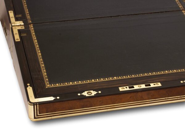 Close up of the writing box facings with brass strengthening inlay